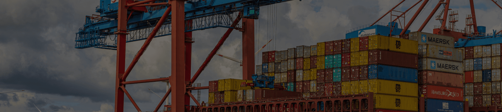 A wide image of containers at a dock